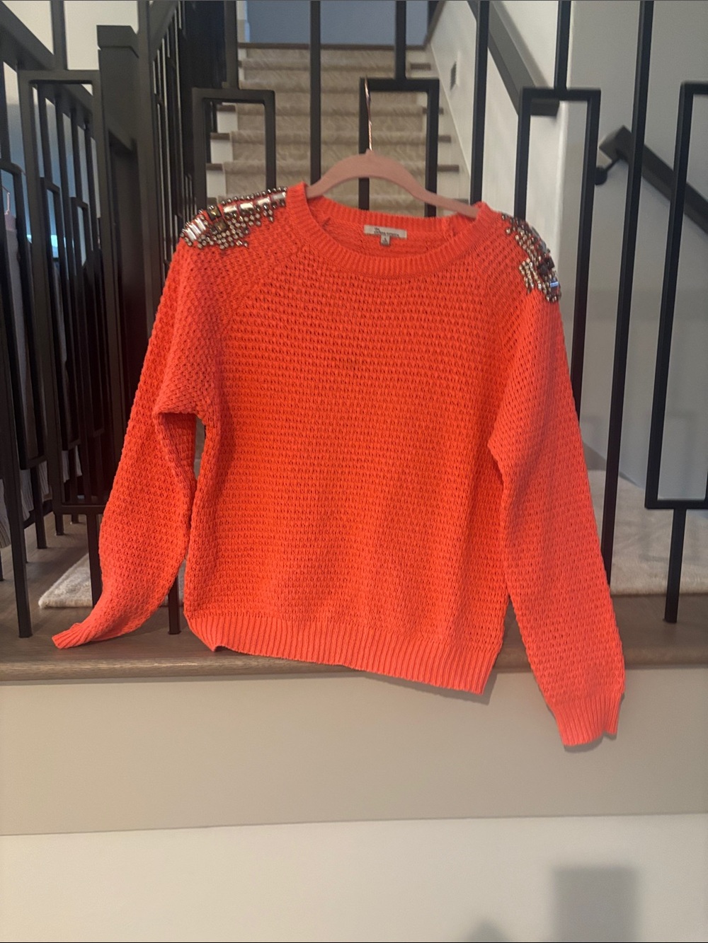 the clothing company Orange Beaded Shoulder Crewneck Sweater
